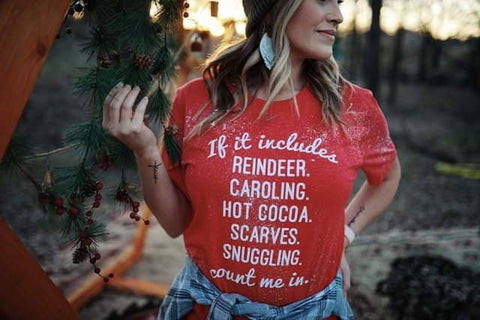 If it Includes (Christmas Edition) | Seasonal T-Shirt | Ruby’s Rubbish® - Ruby's Rubbish Wholesale